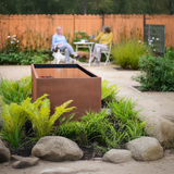 Rectangular Raised Pond in a garden setting with a Corten Steel Finish